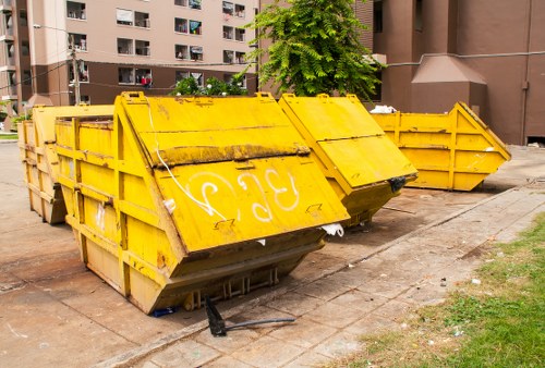 Construction site with waste clearance equipment in East Ham