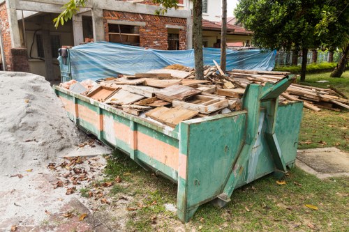 Furniture clearance team removing items in East Ham